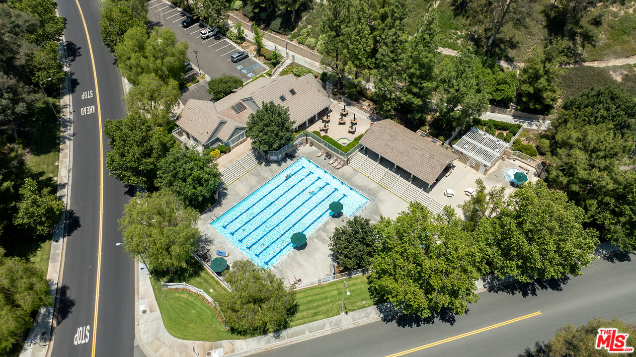 27050 Riversbridge Way Valencia, CA 91354 - Photo 30 of 37 an aerial view of a house with a yard and outdoor seating