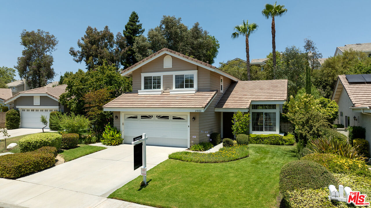 27050 Riversbridge Way Valencia, CA 91354 - Photo 37 of 37 a front view of a house with a yard