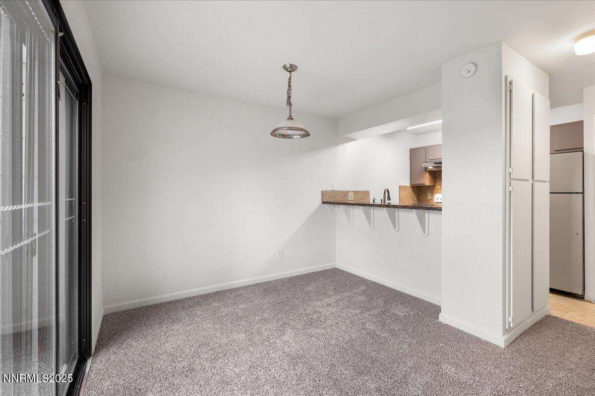 4418 Matich Drive Reno, NV 89502 - Photo 11 of 37 a view of a room with an empty space