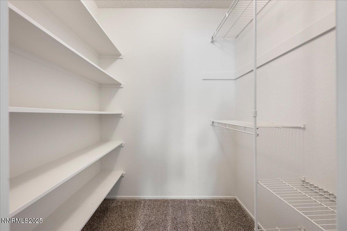 4418 Matich Drive Reno, NV 89502 - Photo 22 of 37 a view of walk in closet with empty racks