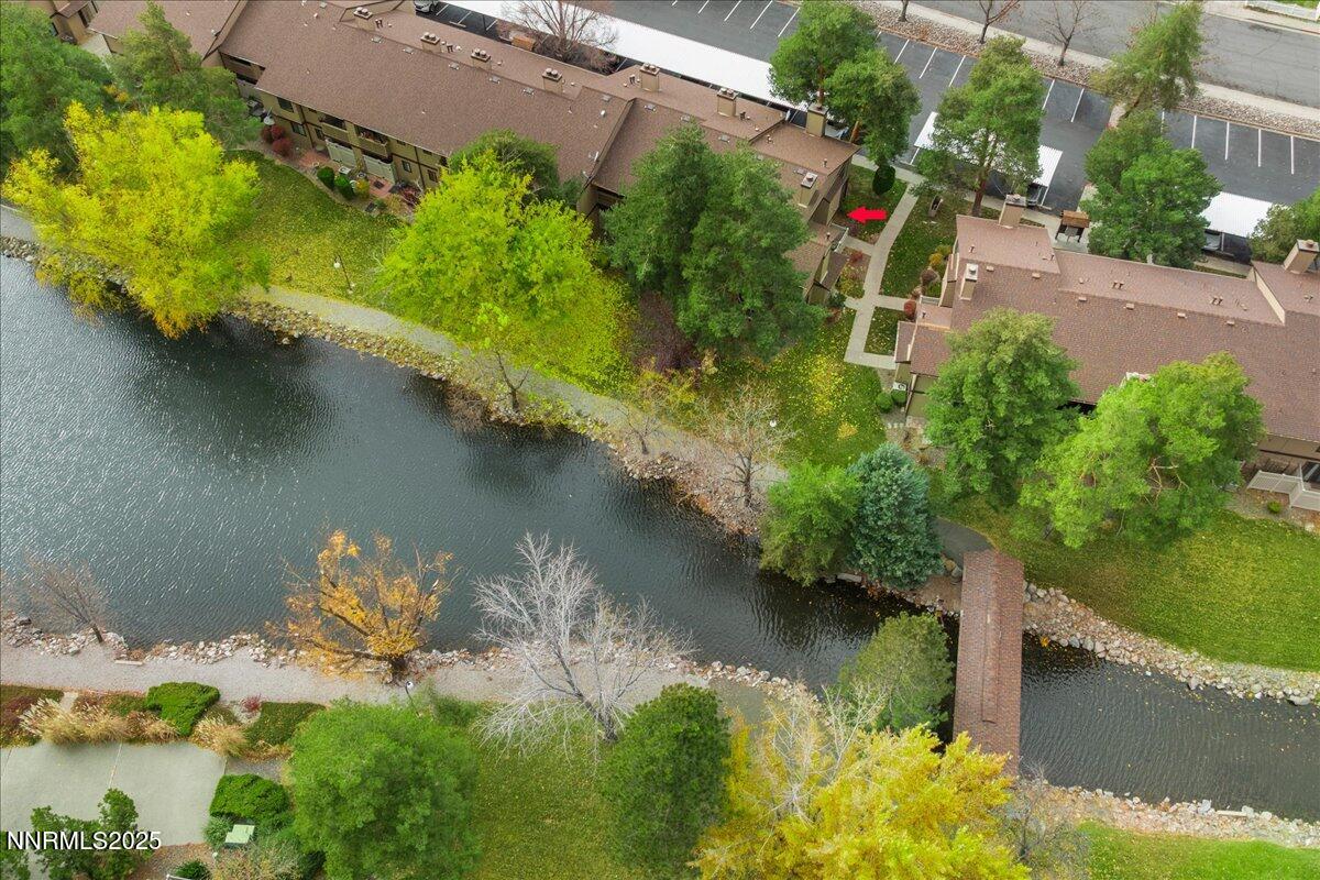4418 Matich Drive Reno, NV 89502 - Photo 32 of 37 an aerial view of a house with a yard and lake view
