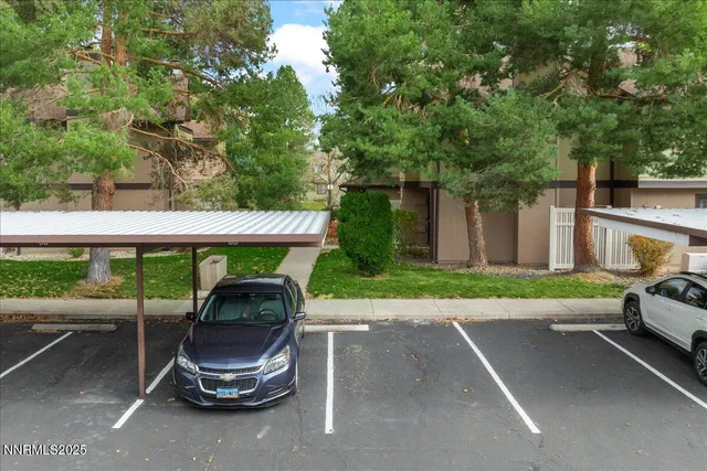 a view of a patio with a table and a chairs