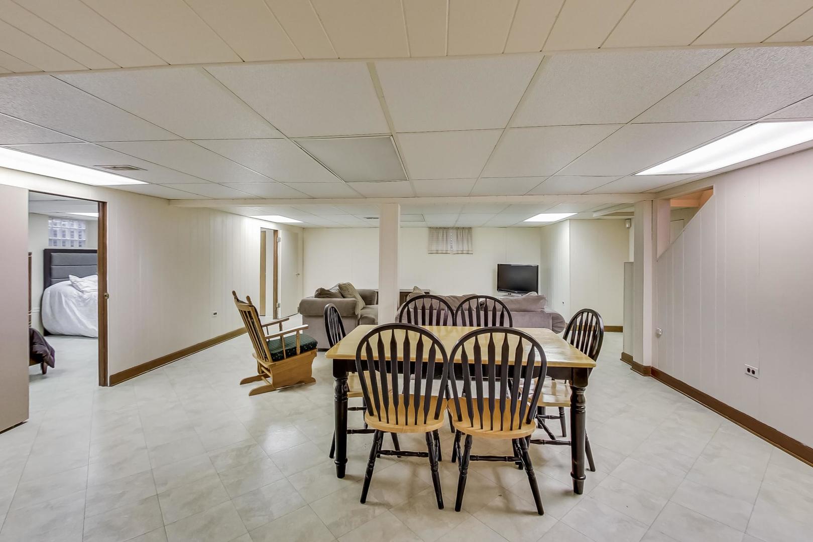 715 Lamon Avenue Wilmette, IL 60091 - Photo 36 of 54 a bedroom with furniture and a window