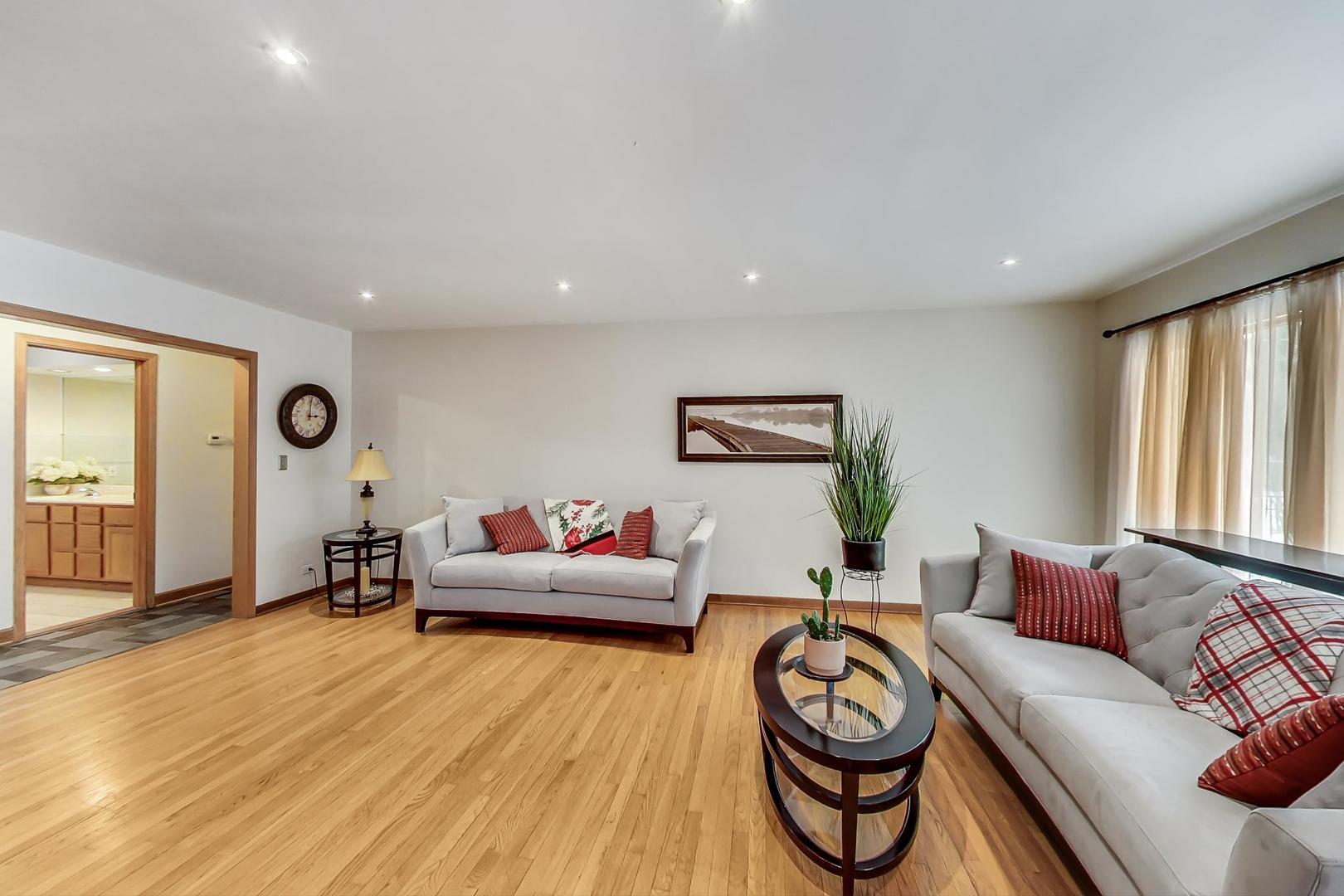 715 Lamon Avenue Wilmette, IL 60091 - Photo 8 of 54 a living room with furniture and window
