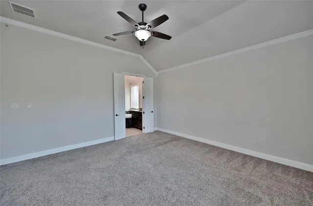 an empty room with fan