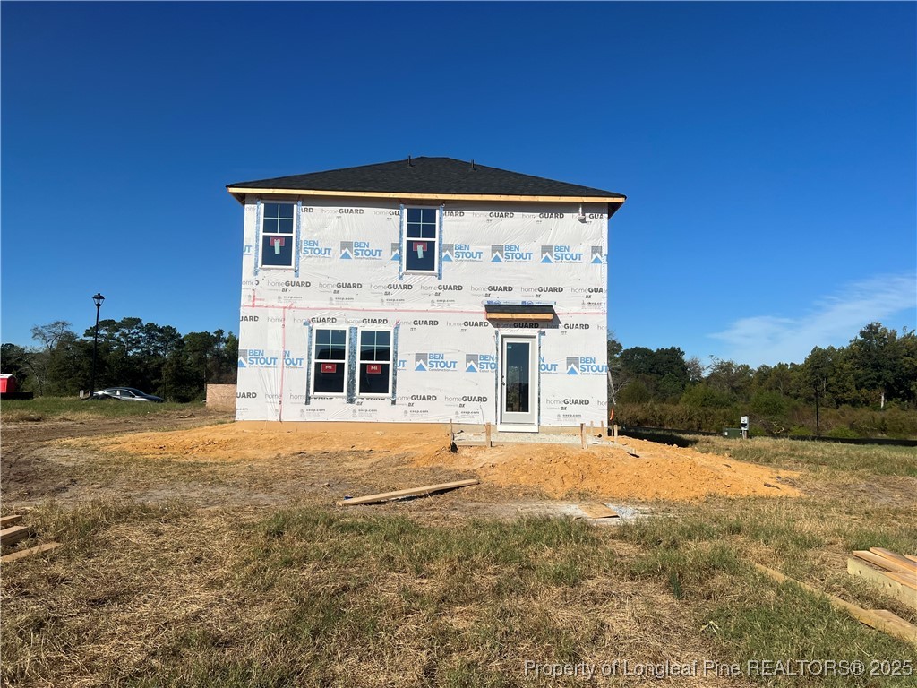 18 Coachman Lane Autryville, NC 28318 - Photo 2 of 7 a front view of a house with a yard