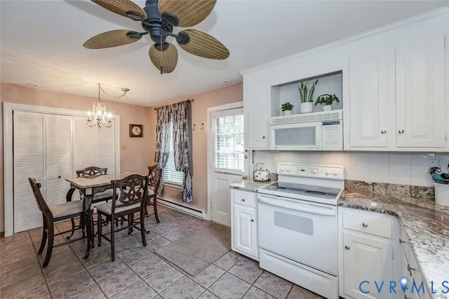 a view of a dining room with furniture