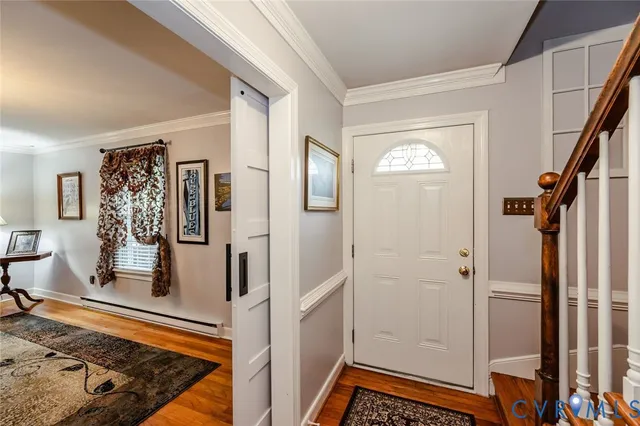 a view of a living room and dining room