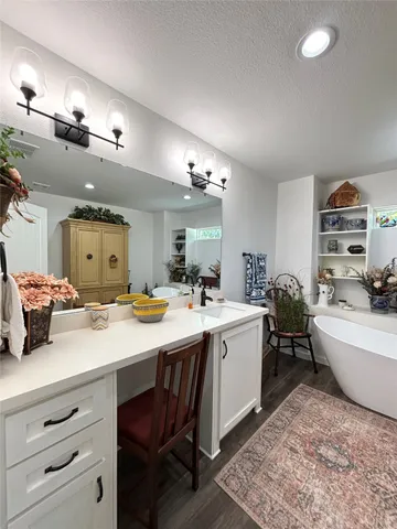 a kitchen with a sink and stove
