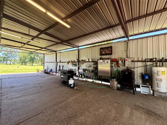 a view of a swimming pool with chairs