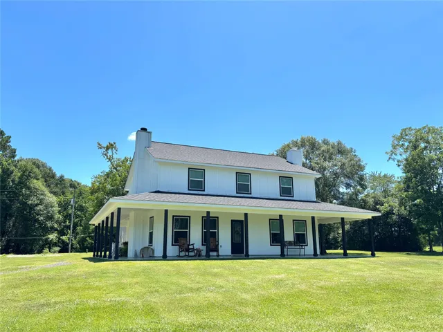a view of a house with a swimming pool