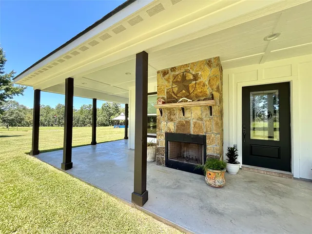 a view of an entryway with a fireplace