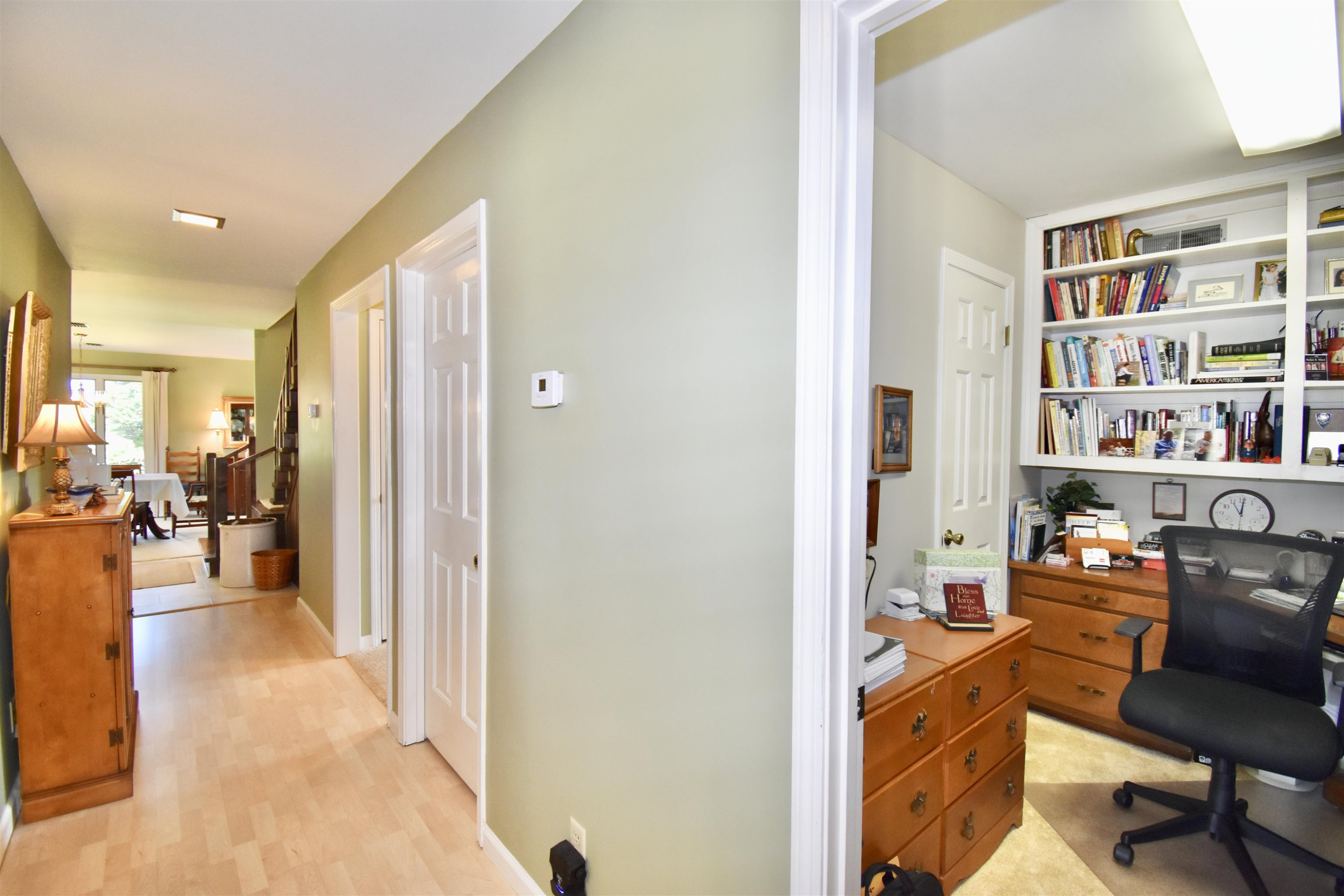 2415 Dry Creek Road Toone, TN 38381 - Photo 10 of 24 a view of a hallway with workspace and a couch
