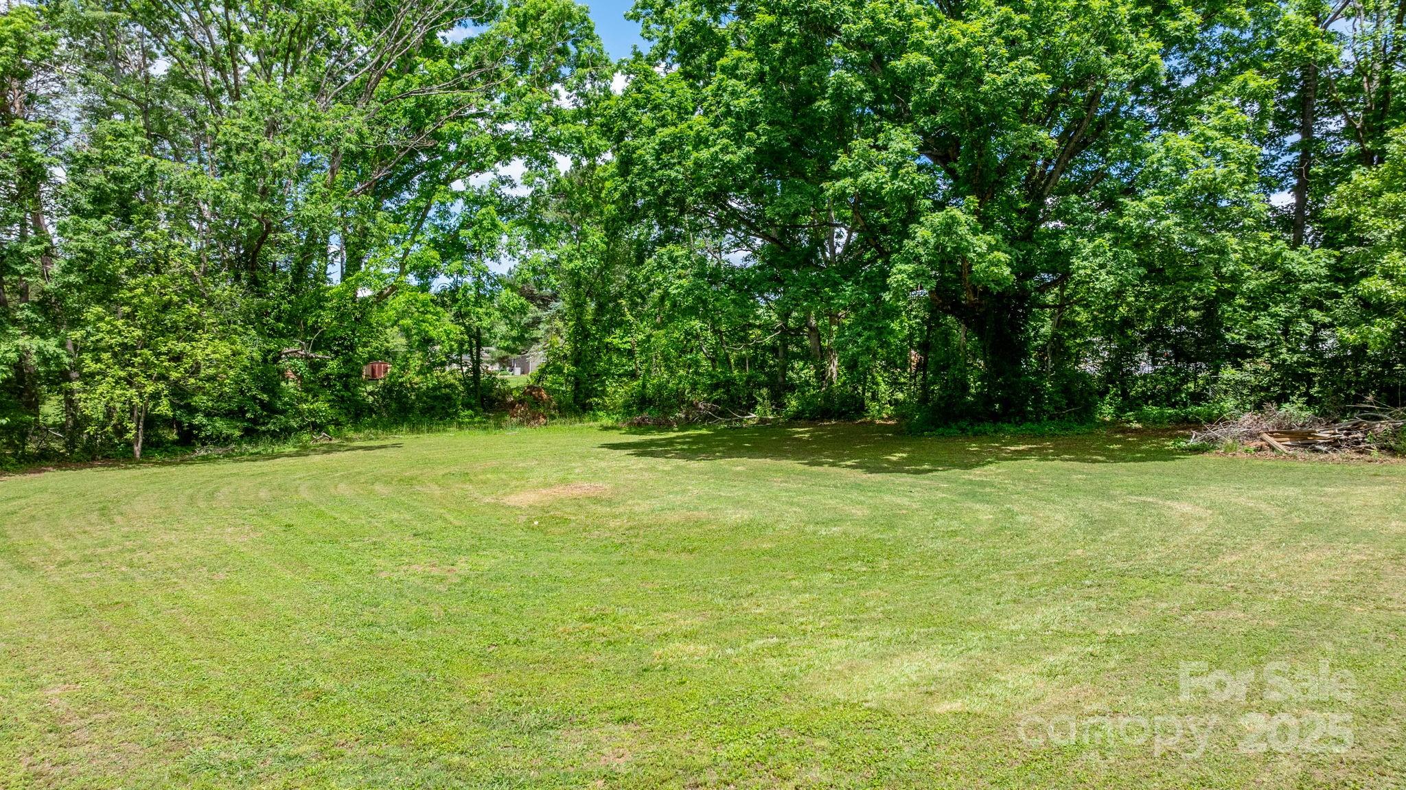 1826 Walt Arney Road Lenoir, NC 28645 - Photo 20 of 40 a view of outdoor space with deck and yard