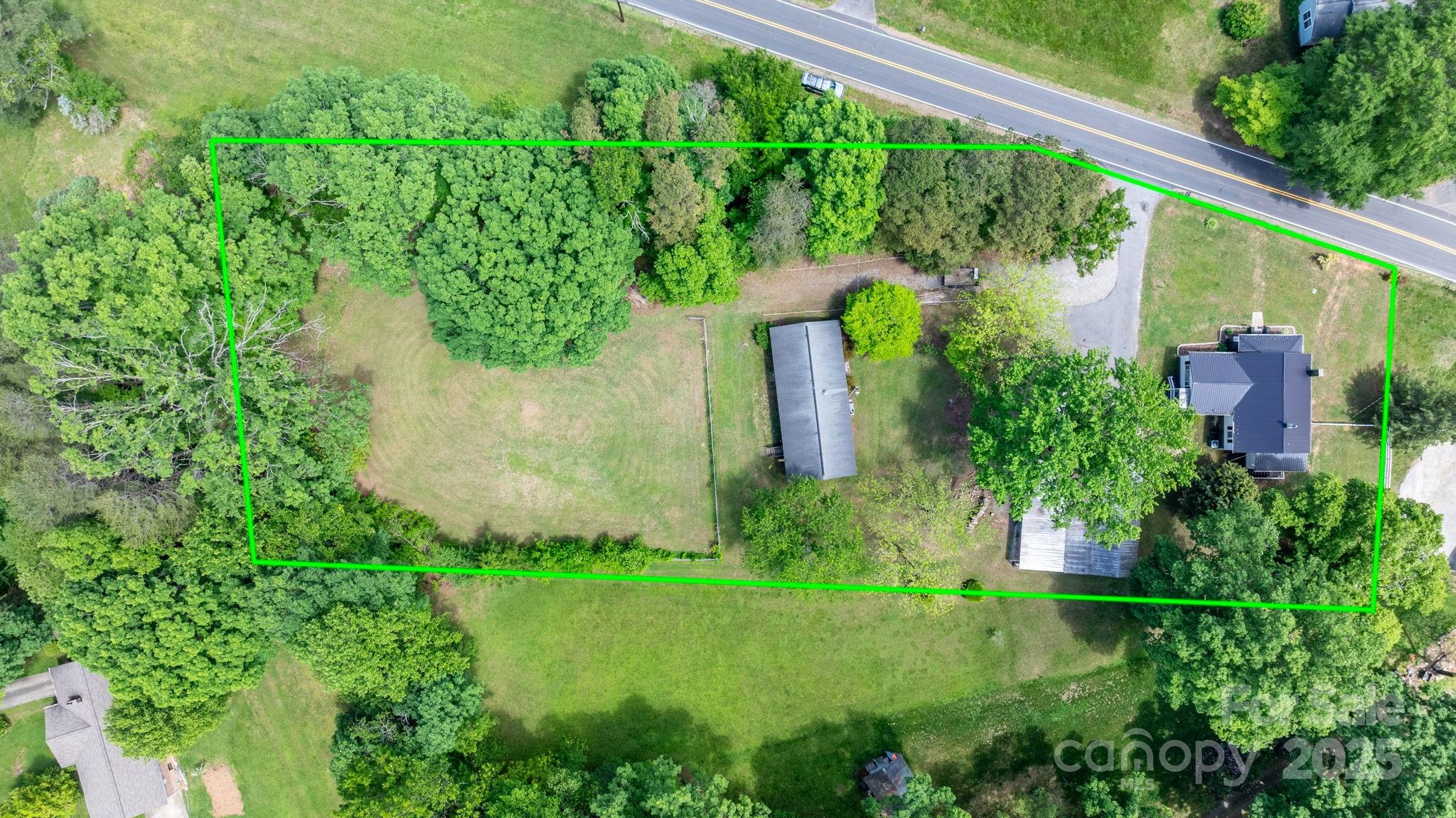 1826 Walt Arney Road Lenoir, NC 28645 - Photo 21 of 40 a view of a garden with plants