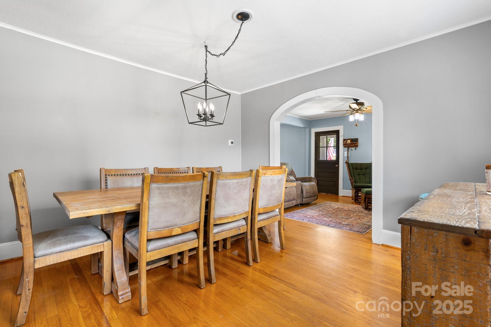 1826 Walt Arney Road Lenoir, NC 28645 - Photo 30 of 40 a view of a dining room with furniture and wooden floor