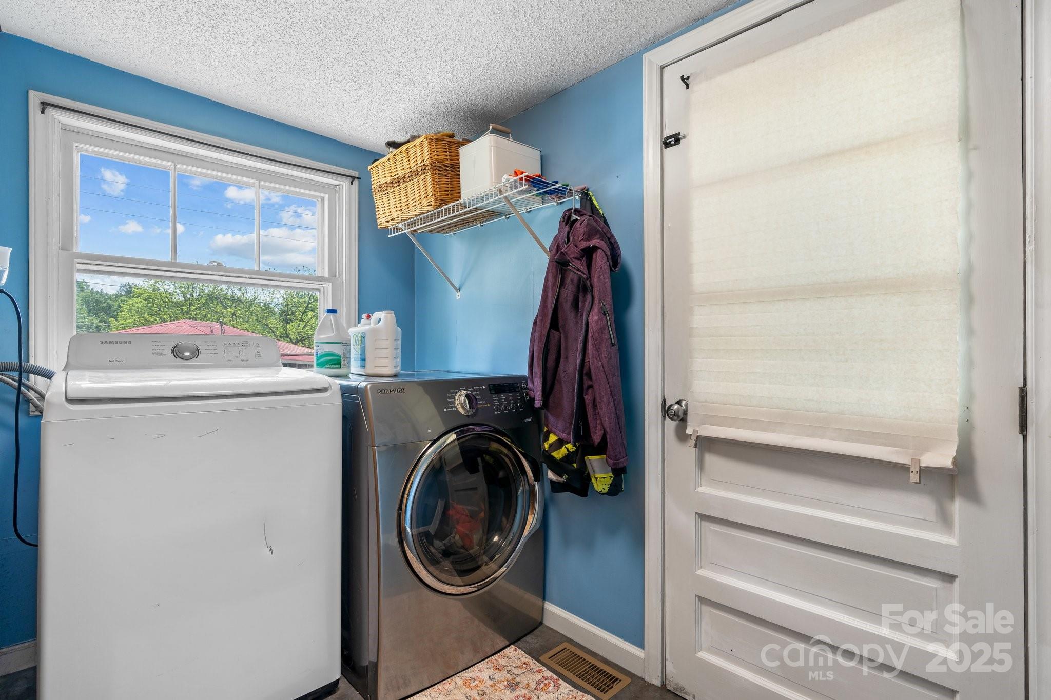 1826 Walt Arney Road Lenoir, NC 28645 - Photo 38 of 40 a utility room with dryer and washer