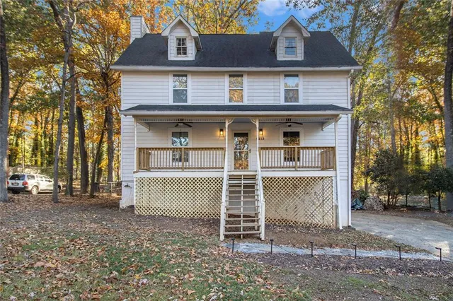 front view of a house with a yard