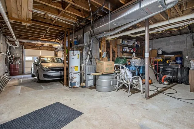a view of parking garage with cars