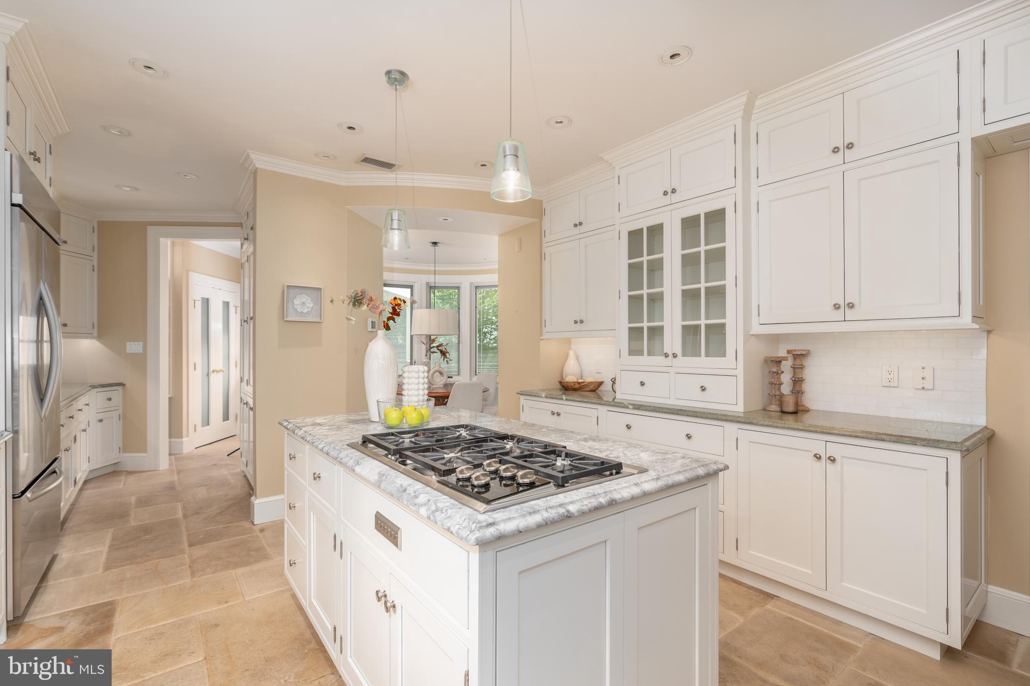 2911 45th Street Northwest Washington, DC 20016 - Photo 13 of 49 a kitchen with a stove a sink and a refrigerator