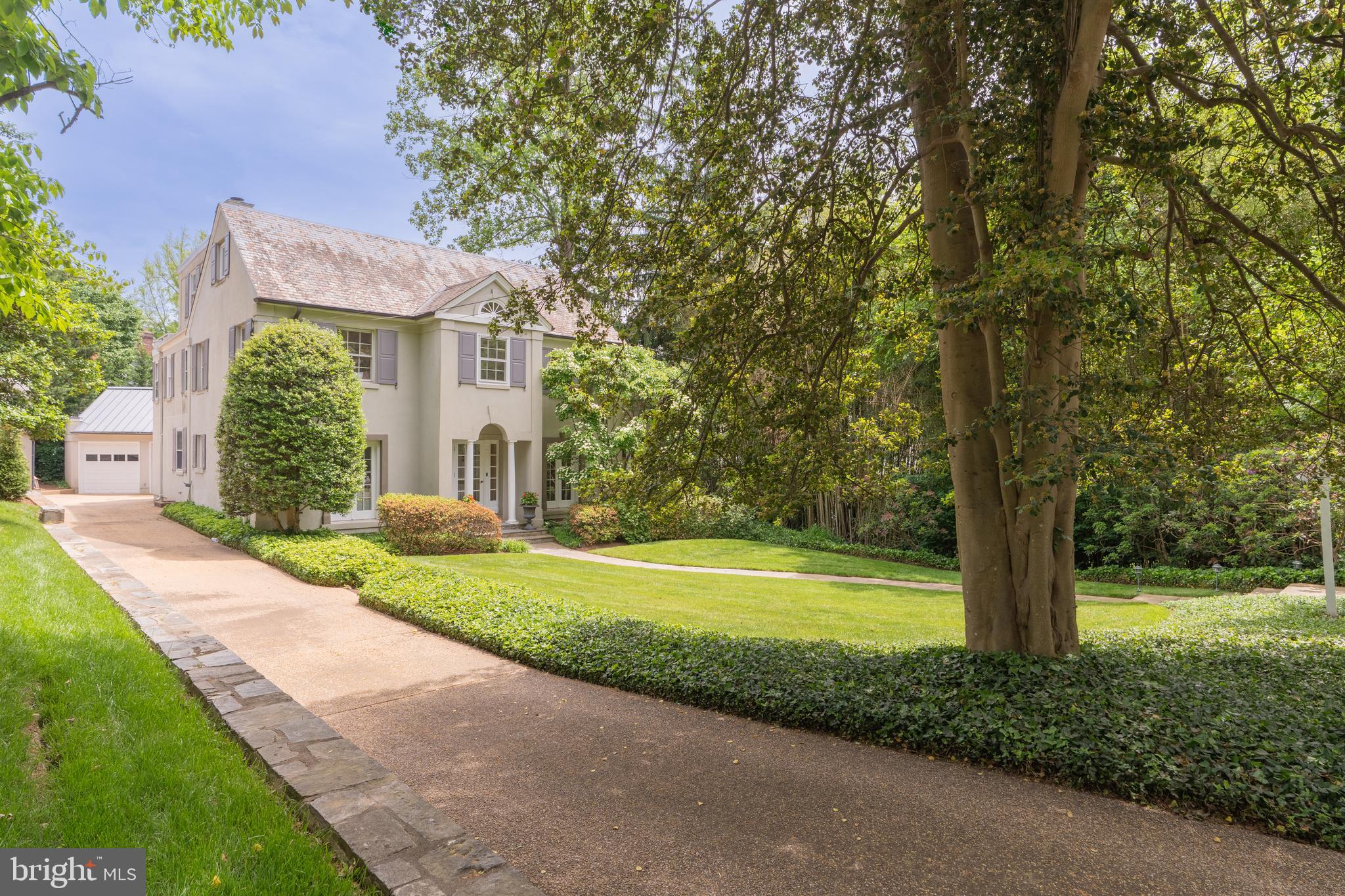 2911 45th Street Northwest Washington, DC 20016 - Photo 2 of 49 a view of a house with a yard and large tree