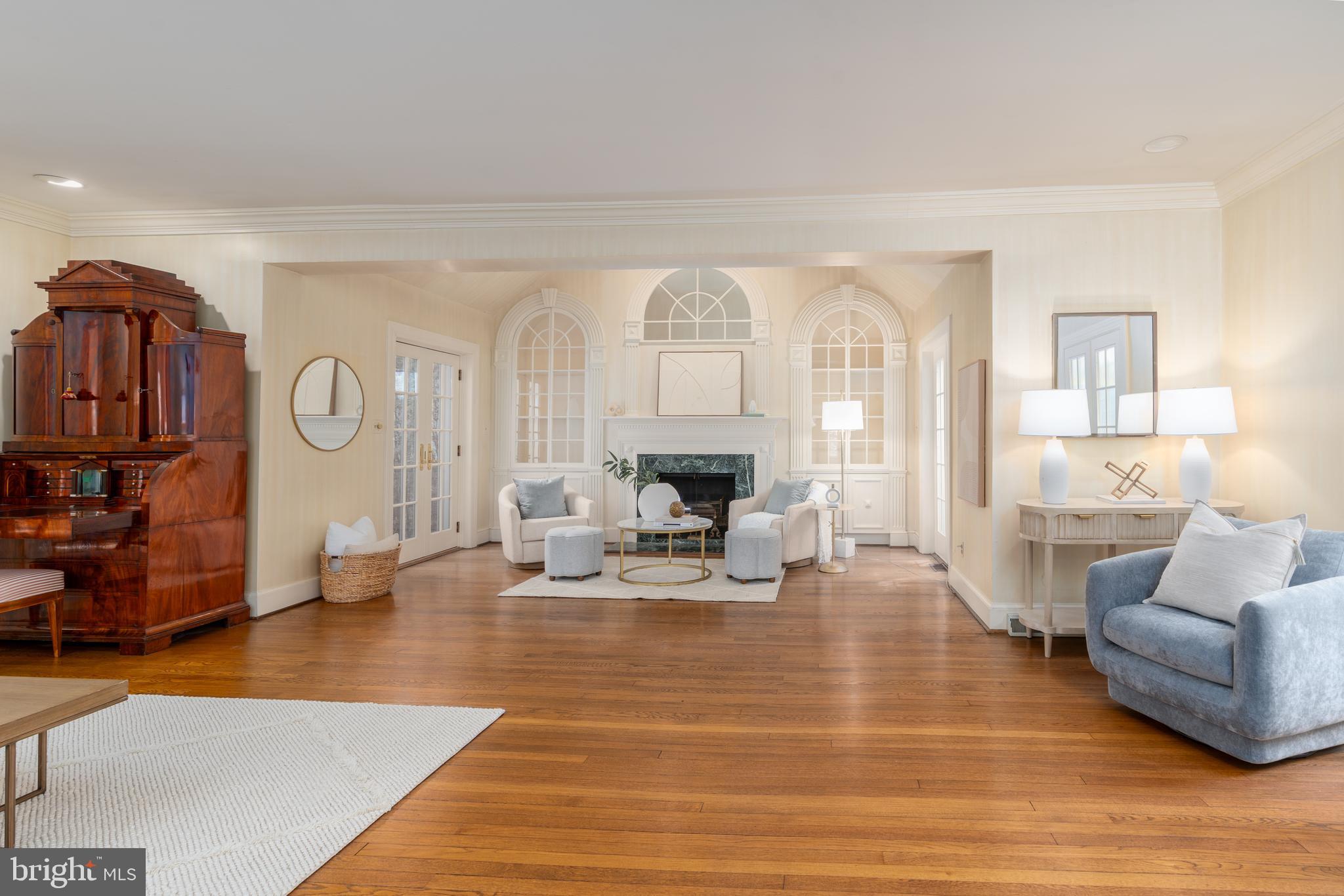 2911 45th Street Northwest Washington, DC 20016 - Photo 22 of 49 a living room with furniture and a fireplace