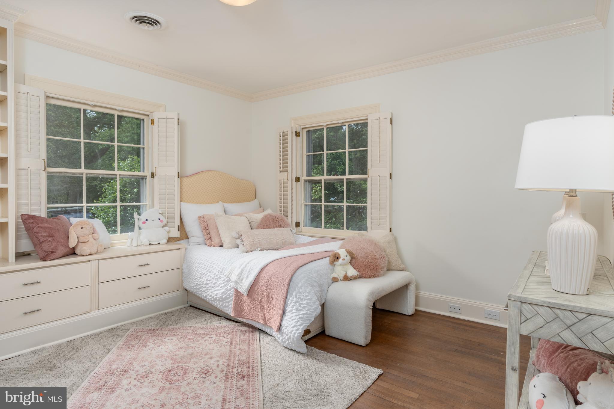 2911 45th Street Northwest Washington, DC 20016 - Photo 25 of 49 a bed room with a bed and a window