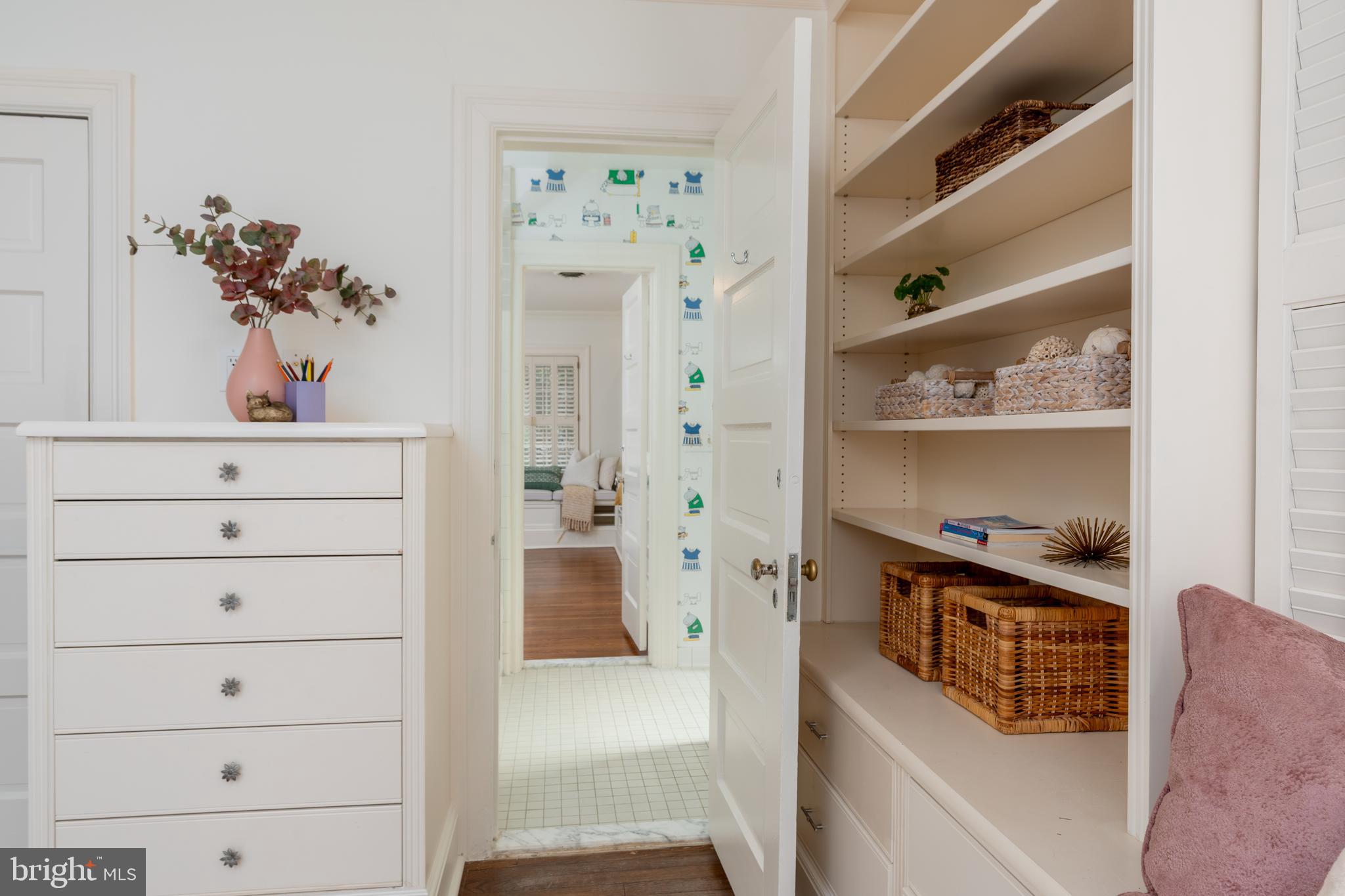 2911 45th Street Northwest Washington, DC 20016 - Photo 26 of 49 a hallway with cabinet with wooden floor