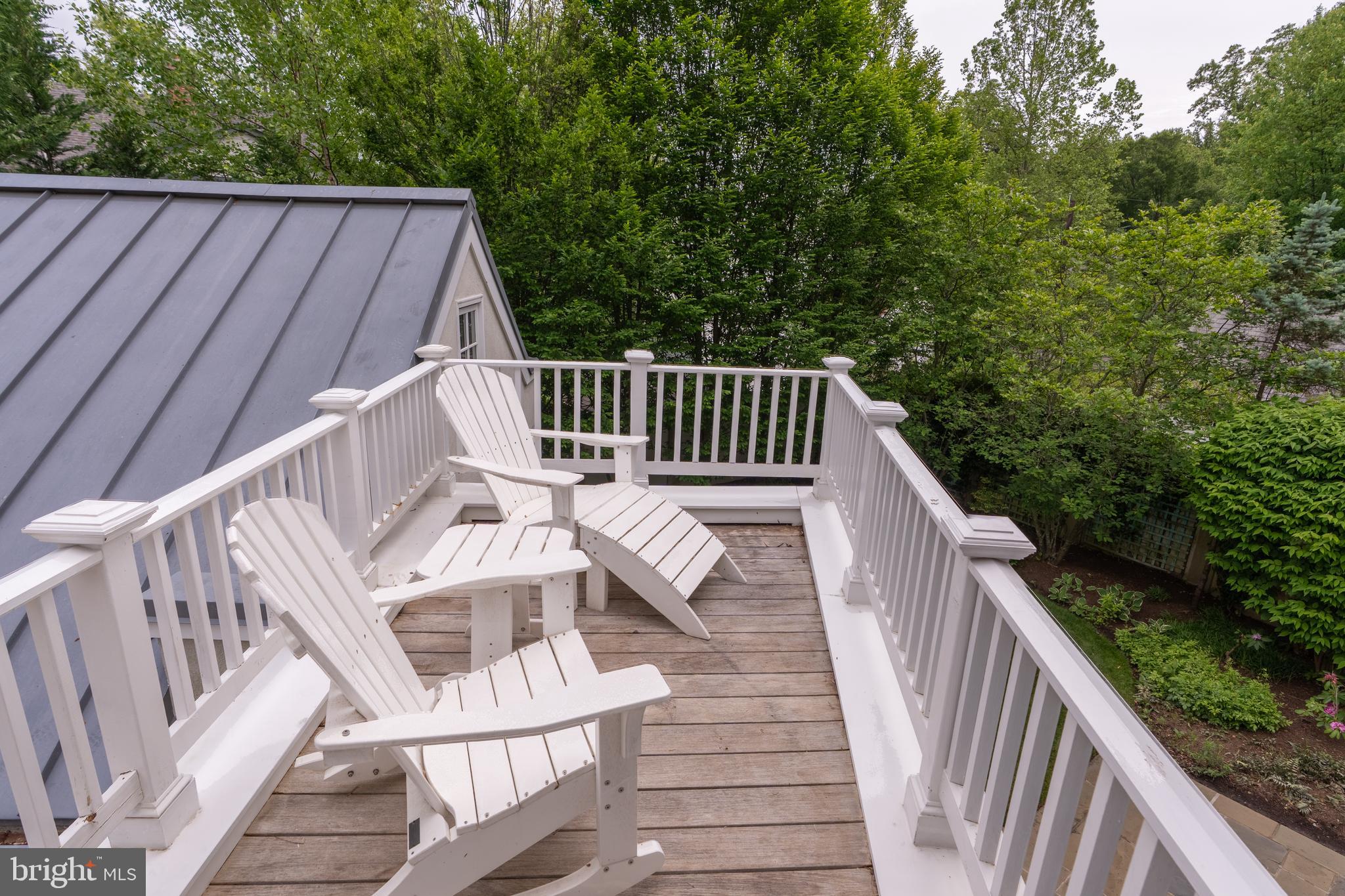 2911 45th Street Northwest Washington, DC 20016 - Photo 34 of 49 a view of balcony with wooden floor and fence