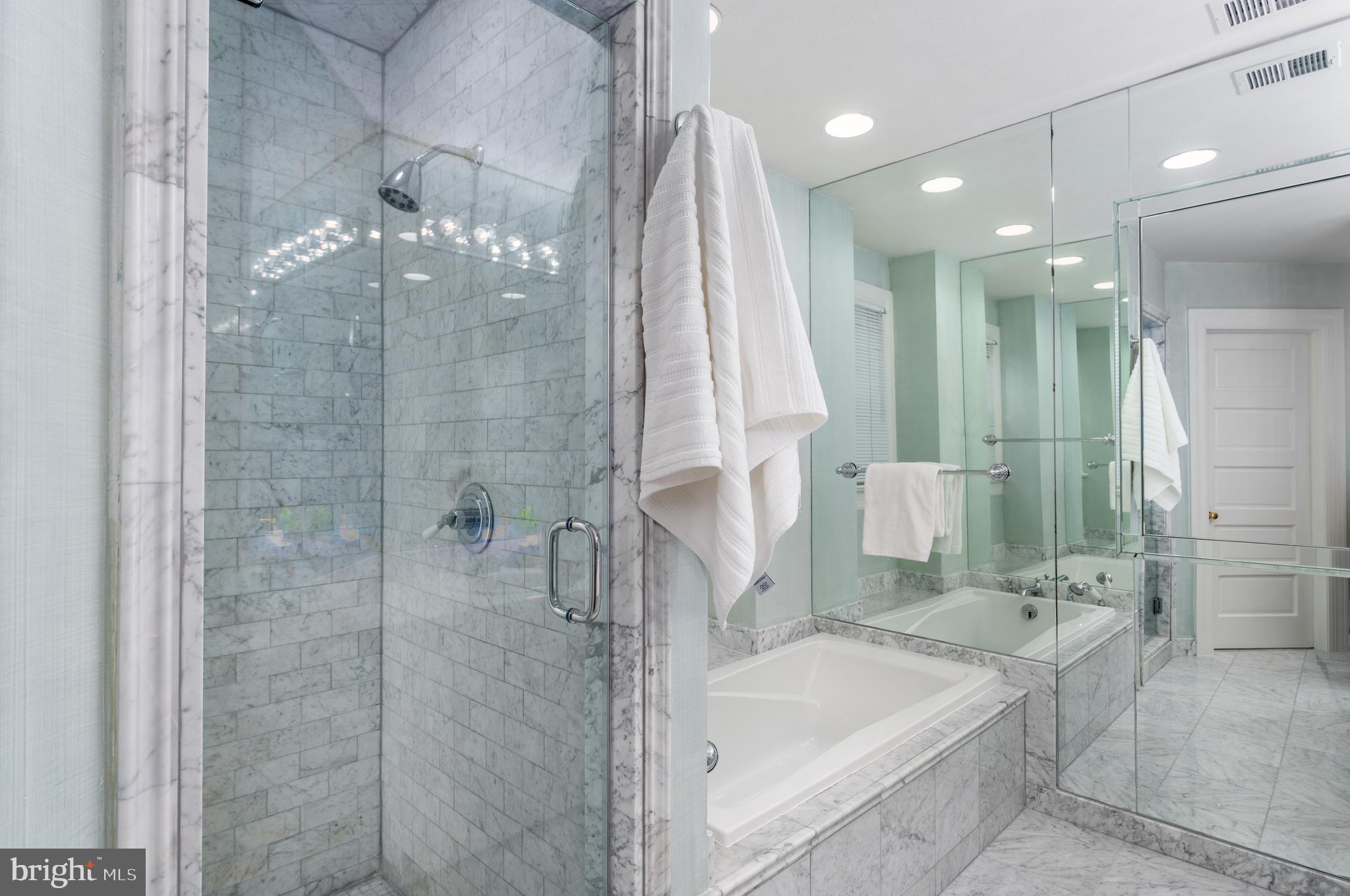 2911 45th Street Northwest Washington, DC 20016 - Photo 36 of 49 a bathroom with a bathtub and a shower