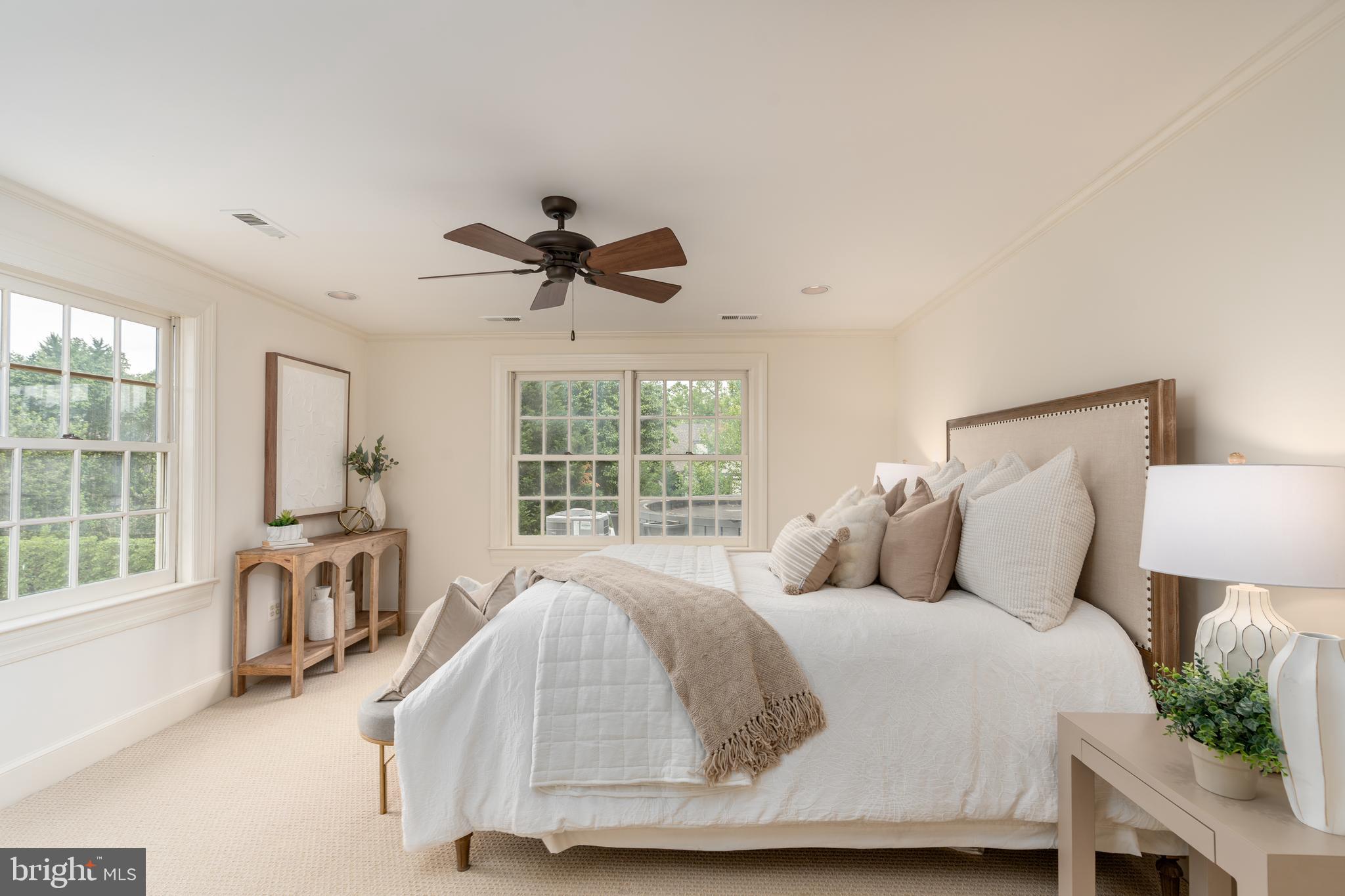 2911 45th Street Northwest Washington, DC 20016 - Photo 37 of 49 a bed room with a bed and a large window