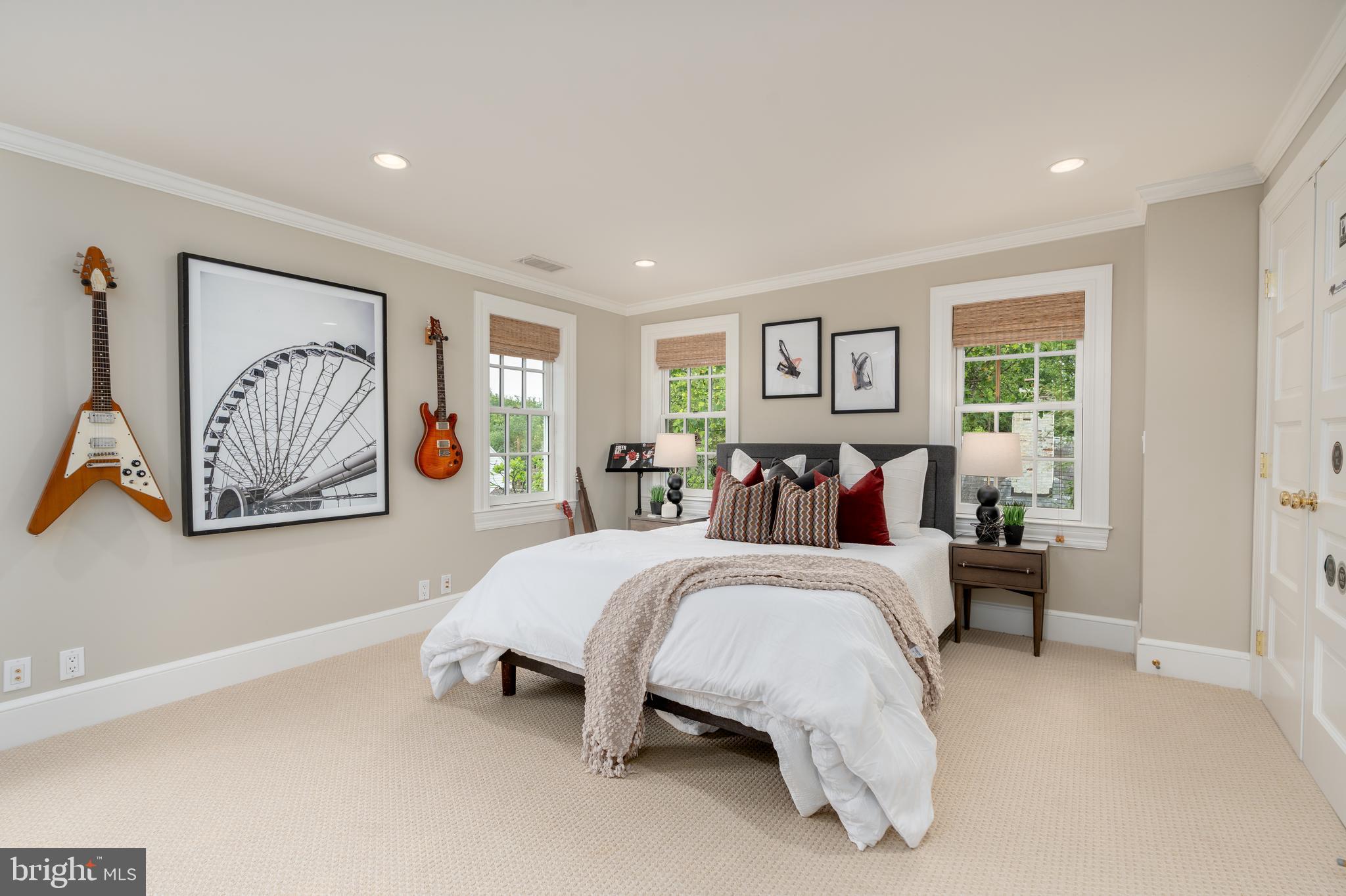 2911 45th Street Northwest Washington, DC 20016 - Photo 39 of 49 a bed room with furniture and a window