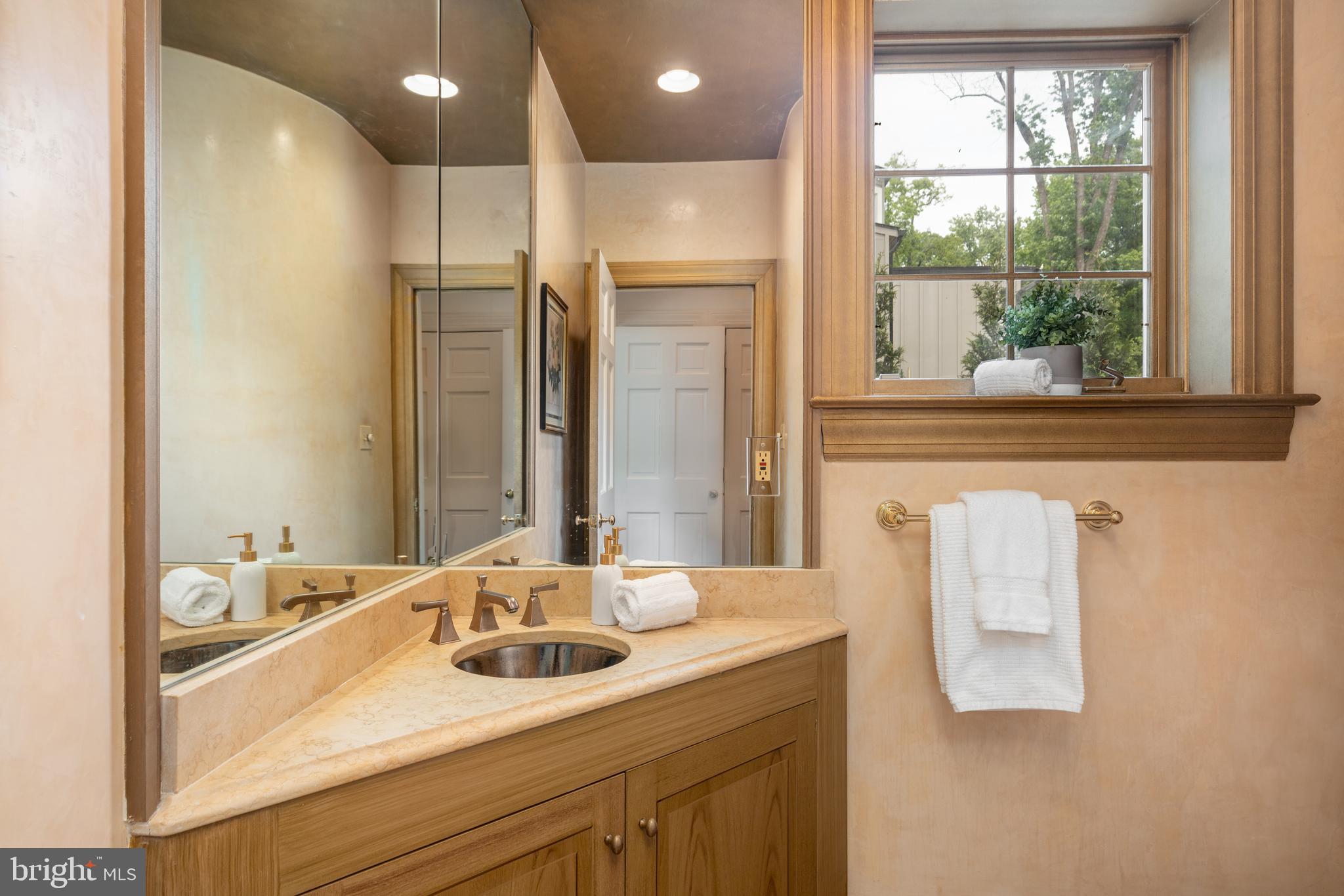 2911 45th Street Northwest Washington, DC 20016 - Photo 8 of 49 a bathroom with a sink double vanity and a mirror