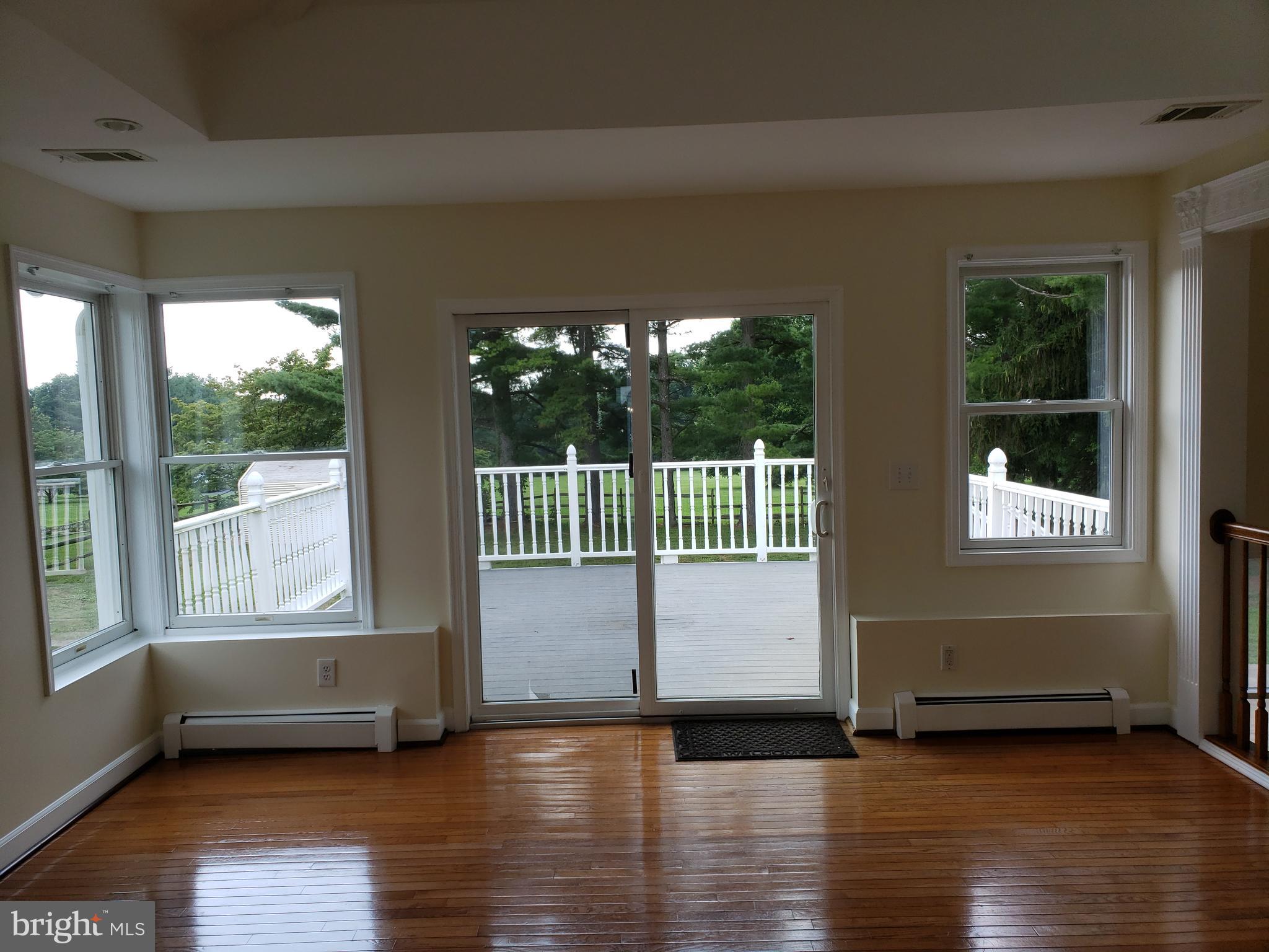 22812 Wildcat Road Gaithersburg, MD 20882 - Photo 14 of 40 Family Room Exit to Deck