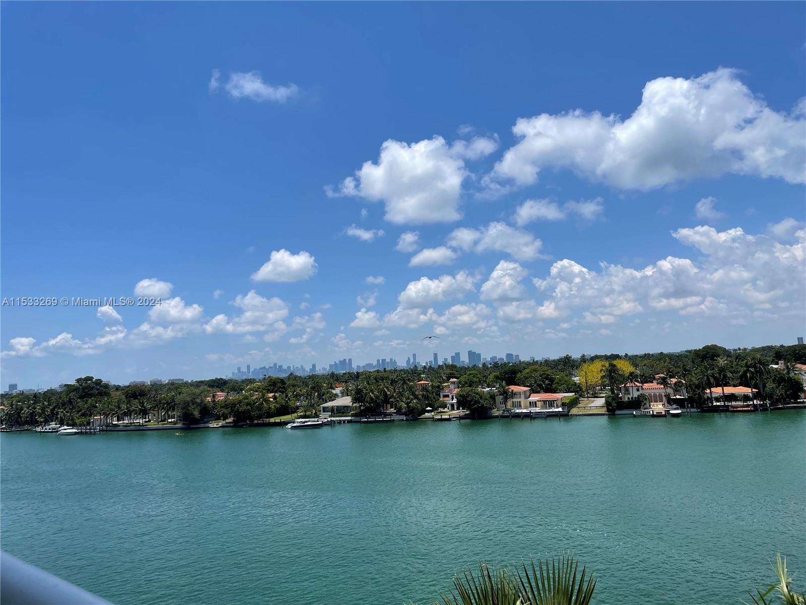 a view of a lake and houses with outdoor space