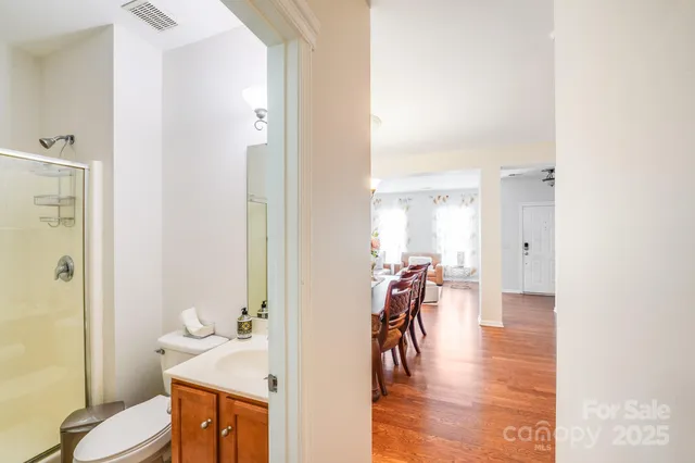 a spacious bedroom with a bed and a window