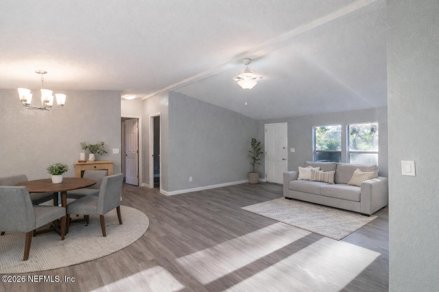 3245 Byo Road Jacksonville, FL 32207 - Photo 7 of 25 a living room with furniture and a large window