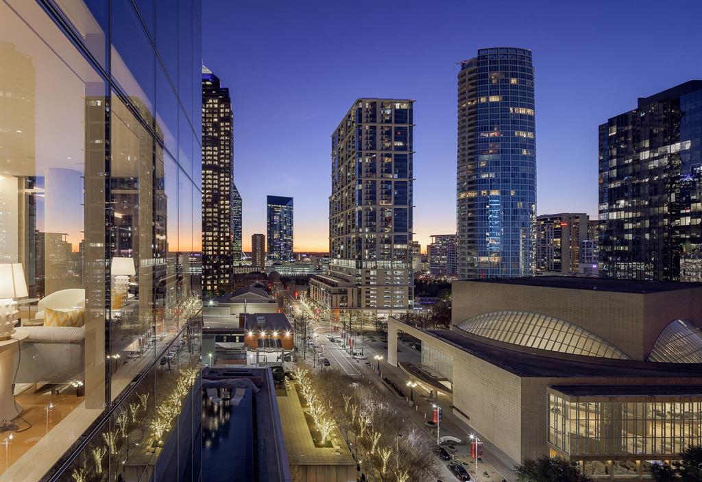 a city street filled with lots of tall buildings