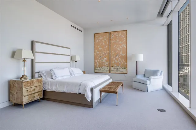 a bathroom with a tub and a sink