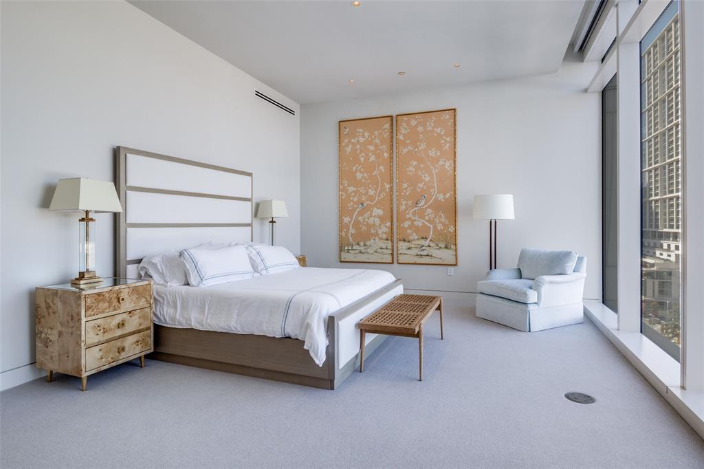 1747 Leonard Street, Unit 802 Dallas, TX 75201 - Photo 11 of 26 a bedroom with bed and window