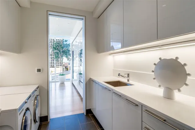 a view of roof deck with furniture