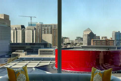 a view of a balcony with city view