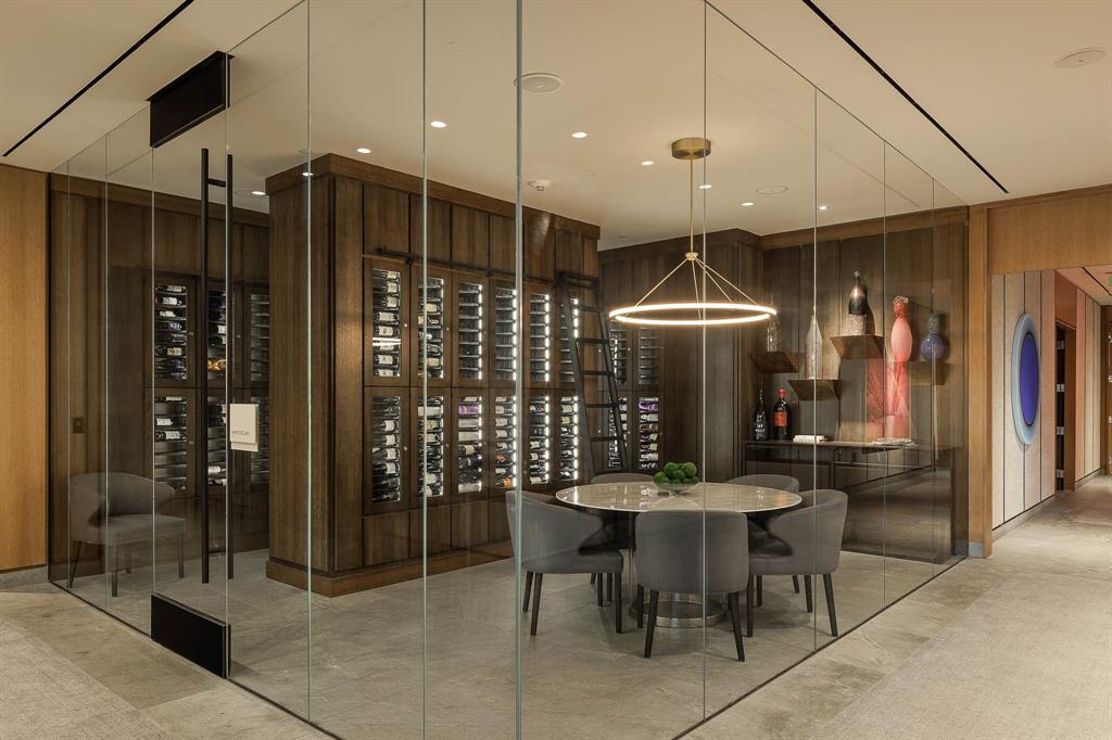 1747 Leonard Street, Unit 802 Dallas, TX 75201 - Photo 22 of 26 a dining room with furniture and window