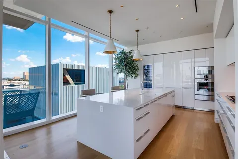 a bedroom with bed and window