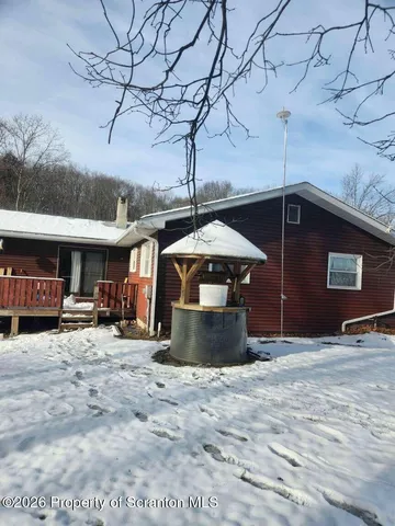 a view of a car park in front of a building