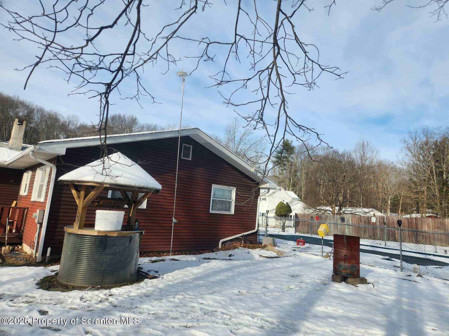 374 Country Road Falls, PA 18615 - Photo 7 of 21 a front view of a house with a yard