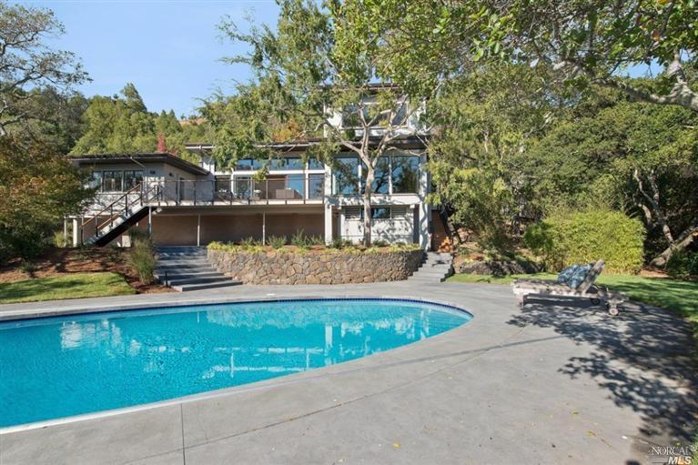 15 Morrison Road Ross, CA 94957 - Photo 1 of 1 a view of a swimming pool with a patio