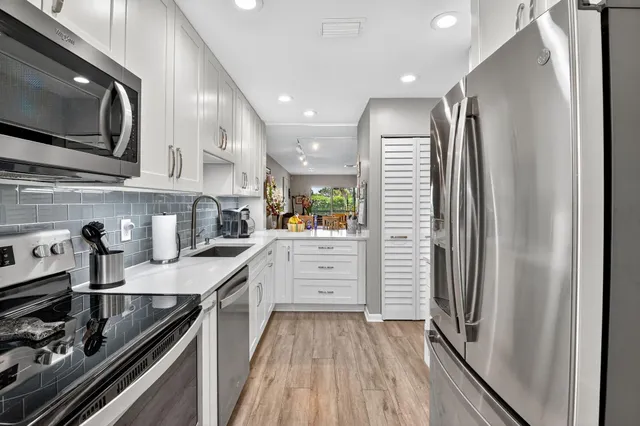 $5,000 | 13 Southport Lane, Unit F, Boynton Beach, FL 33436