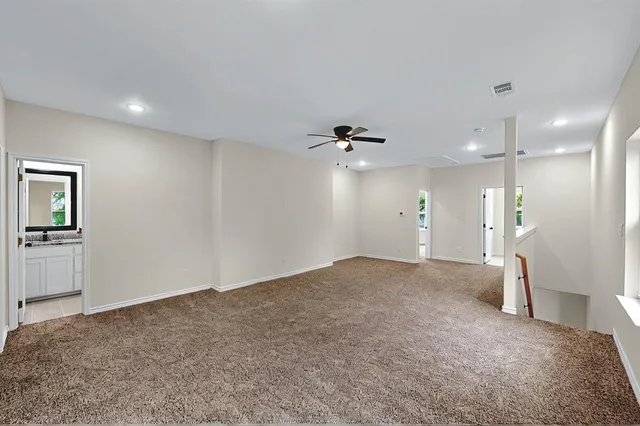 a view of a livingroom with a kitchen