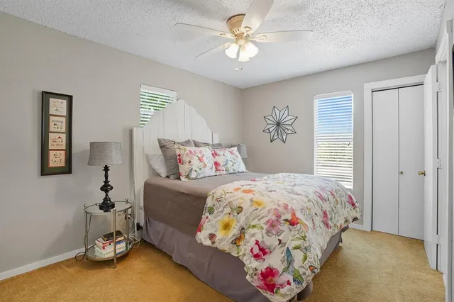 a bathroom with double vanity sink and a mirror
